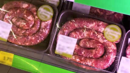 Fresh Munich Sausages: Supermarket Chilled Display | Traditional German Bratwurst in Protective Packaging | Raw Pork Delicacy for Gourmet Shoppers | Authentic Culinary Experience