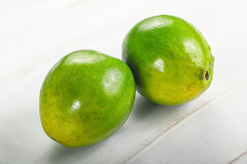 Two ripe green exotic avocado fruit