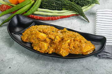 Spicy chicken masala in the bowl