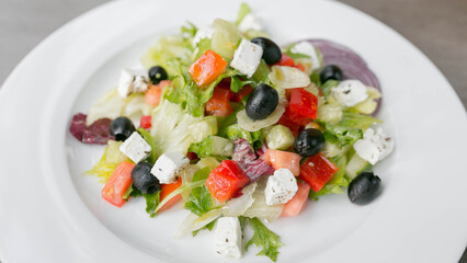 Greek salad, olives, lettuce, cucumber, tomato, Philadelphia cheese