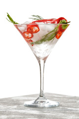 Cold mocktail water drink with fresh rosemary and red red hot chilli pepper in glass on wooden table and  white background. 