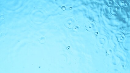Texture of Dropping Water Drops on Surface, Overhead Shot.