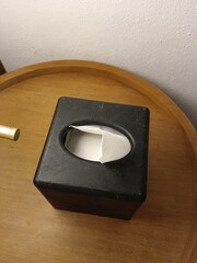 black tissue box