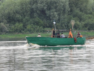 Fototapeta premium fishing boat on the river