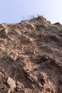 Steel protective net or mesh to prevent rockfall. rockfall protection netting prevent 