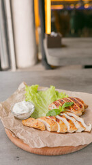 grilled chicken fillet, restaurant dish for the menu