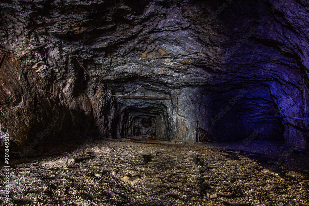 Wall mural photo taken in a mine shaft. abandoned mine for mining rocks. dark abandoned corridors near amal, sw