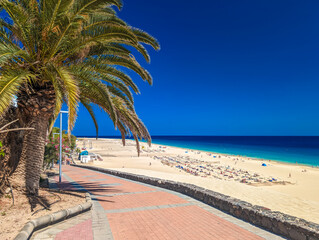 White sandy beach and blue water in Morro Jable, south of Fuerteventura, Canary islands