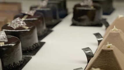Pan of various pastries in a display case.
