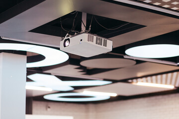 Projector hang on ceiling in meeting room