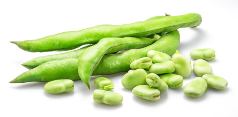 Green broad bean pod and several broad beans isolated on white background.