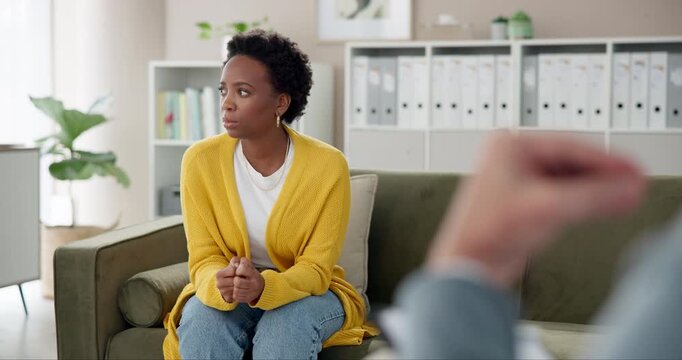 Psychology, meeting and woman with anxiety in office for trauma, advice and ptsd counseling. Stress, patient and psychologist with guidance in communication for hypervigilance, trigger or sensitivity