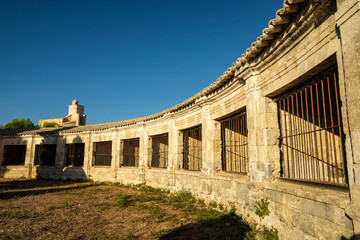 Fototapeta premium Barred oratories for quarantiners, Lazareto Island, Illa del Llatzeret, interior of the port of Mahón, Menorca, Balearic Islands, Spain