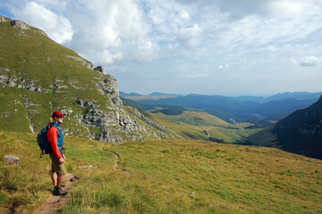 Young hiker in the Bucegi mountains in Romania
