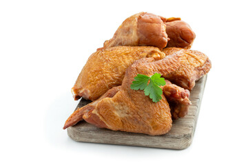 Smoked chicken pieces isolated on white background