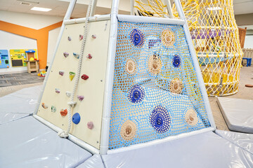 A playground without children, the entrance to the maze with a colorful grid, a children's room in the game entertainment center. With space to copy. High quality photo