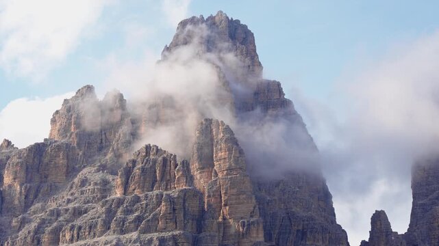 landscape of the mountains during Sunset Cover by clouds. Oragena dn blue colors