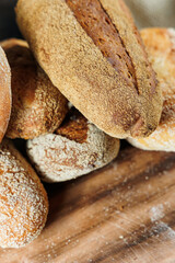 Freshly baked rye bread on a mixture of whole grain, rye and wheat flour. Fresh homemade bread. Craft pastries