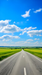 A Lone Achingly Empty Tarmac Road Cutting Through Vast Countryside Fields Under Clear Blue Sky: A Visual Metaphor for Solitude and Tranquillity
