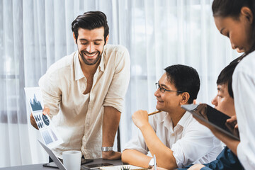 Data analysts team of office worker collaborate on business intelligence BI dashboard to analyze financial, trend, and marketing data. BI software utilization drive business success. Prudent