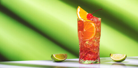 Summer red  alcoholic cocktail drink with vodka, liqueur, orange, cranberry, juice, lemon and ice...