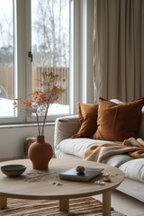 Modern Scandinavian living room with cozy sofa, rustic decor, and natural light