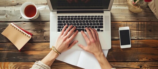 Man writing text document, essay or letter with laptop.