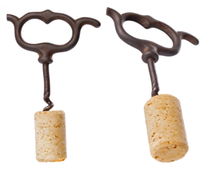 Old corkscrew with a bright cork closing a wine bottle on an isolated background.