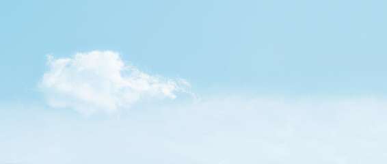 Blue pastel sky with white fluffy cloud. Cumulus clouds background. Cloudscape morning sky.