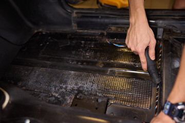 Providing car interior vacuuming services ensures cleanliness and hygiene in automobiles