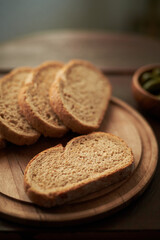 Sliced Whole Grain Bread on Wooden Platter