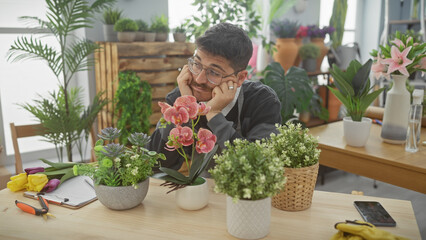 A thoughtful hispanic man with a moustache surrounded by colorful flowers in a cozy indoor flower...