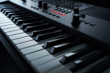 Close-up of a modern electronic keyboard with illuminated controls, perfect for musical projects and creative compositions.