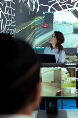 Team leader following the delivery truck through urban traffic, offering directions to the couriers...