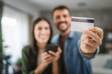 close up of man hand hold credit card and stand