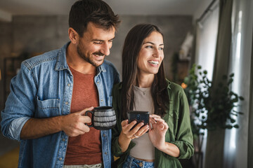 Portrait of girlfriend show mobile phone screen to her boyfriend
