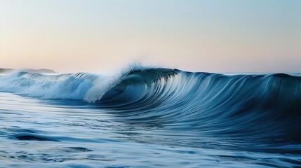 The Perfect Curl: A Blue Ocean Wave Forms a Glassy Barrel