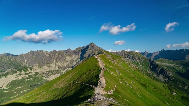 Timelapse of Kasper Peak with a busy mountain trail in the Tatra Mountains, Poland/Slovakia