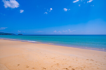 Empty tropical beach and seascape, Beautiful sandy beach and sea in sunny day,Blue sky in good weather day, Beach sea space area nature background