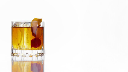 alcoholic cocktail of yellow color with a cherry, in an old-fashioned glass