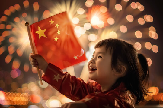 child girl celebrating with chinese flag during festive fireworks display