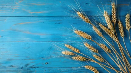 World Food Day Concept with Wheat Ears on Blue Wooden Background