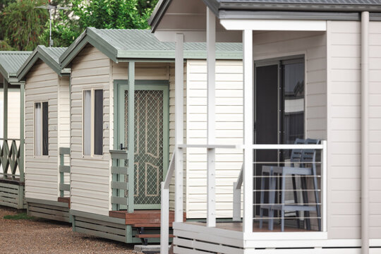 Row of holiday accommodation cabins in a caravan park