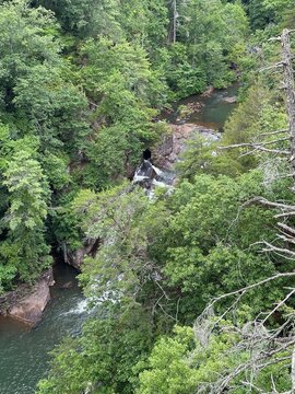 waterfall in the mountains in the forest