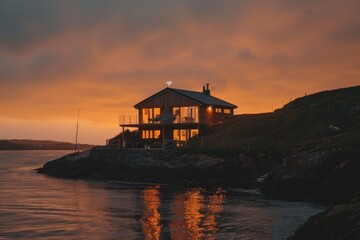 Modern house with sunset lighting by the coast highlighting contemporary design and serene living