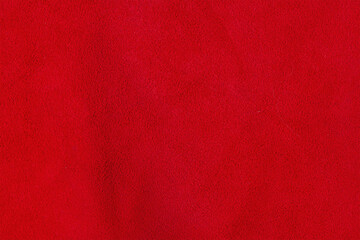 Red suede background. A thin focal part of the red background