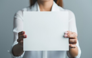 Businesswoman Presenting Empty White Paper