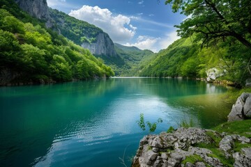 Serene Mountain Lake with Clear Water and Rocky Shore