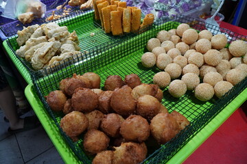 Traditional Indonesian snacks are sold in the market at cheap prices