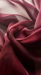 Fototapeta premium Close-up of red and pink chiffon fabric with soft folds, texture background. Textile concept